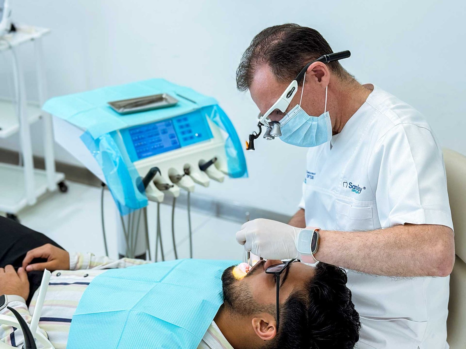Dr. Petros performing dental implant